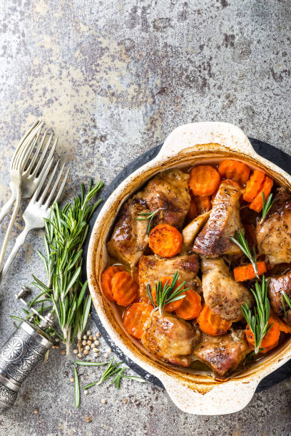 istock Meat baked with carrots in the oven 916714320