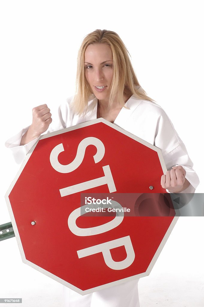 No entry Martial artist with stop sign. Aerobics Stock Photo