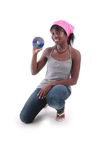 Photo of Dayo: Holding a CD.