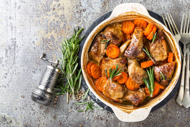 istock Meat baked with carrots in the oven 916718528