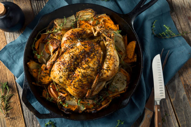 istock Herby Homemade Rustic Whole Skillet Chicken 916724770