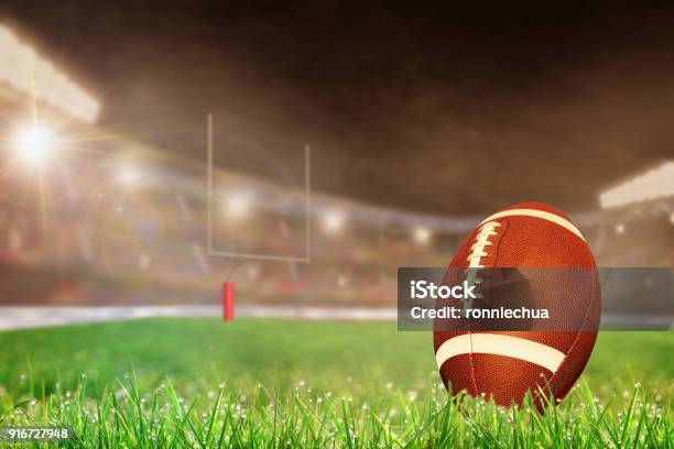 Outdoor Football Stadium With Ball On Grass And Copy Space Stock Photo - Download Image Now
