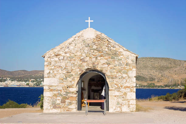 istock Small chapel on the hill, above the sea 916728348