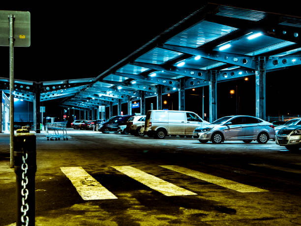 istock night supermarket panorama outside view 916728674