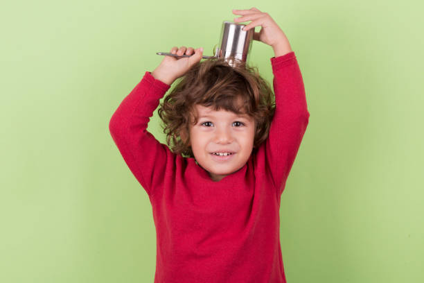 istock Little baby boy , Funny Kid Expression on green background 916741112