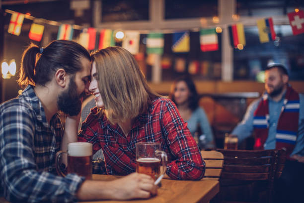 istock Couple sitting in a bar 916741178