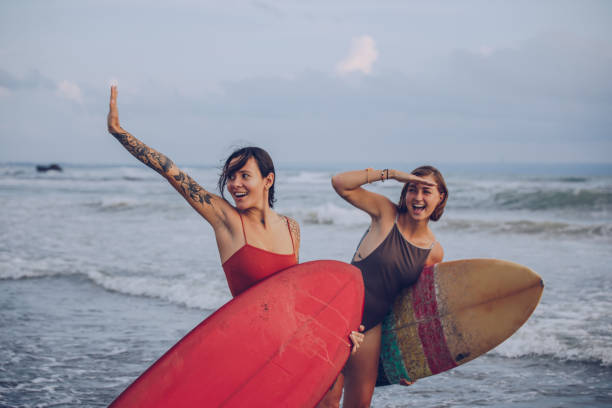 istock Females surfers 916749404