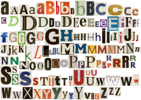 Periódico alfabeto colorido Aislado en blanco photo