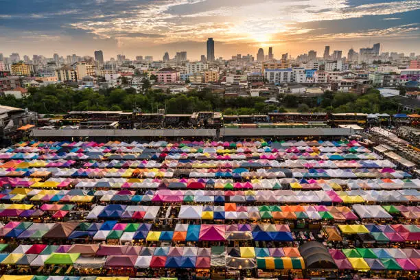 Rod Fai Night Market in Bangkok,Thailand with Colorful Tent and Landscape View in Evening