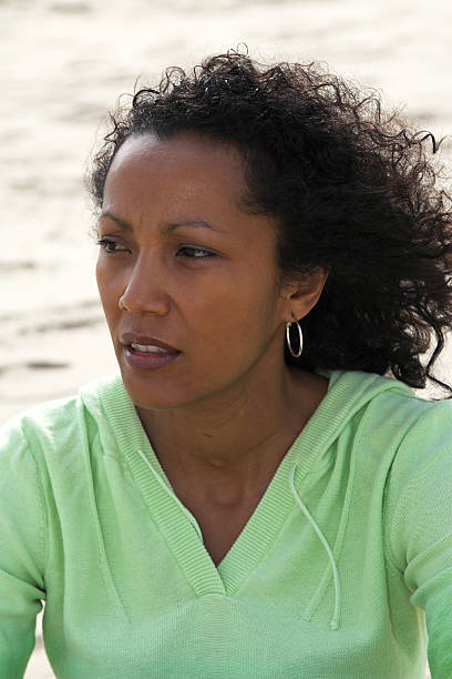 istock Beautiful woman on the beach 91675635
