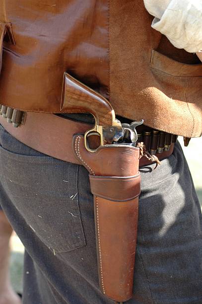 Western pistol in holster stock photo