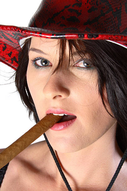 Cowboy woman smoking cigar stock photo