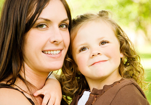 Horizontal portrait of mother and daughter.