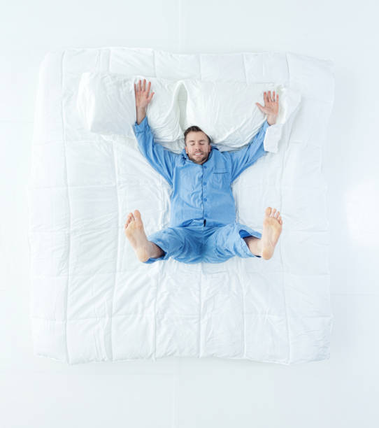 Above view of man in bed