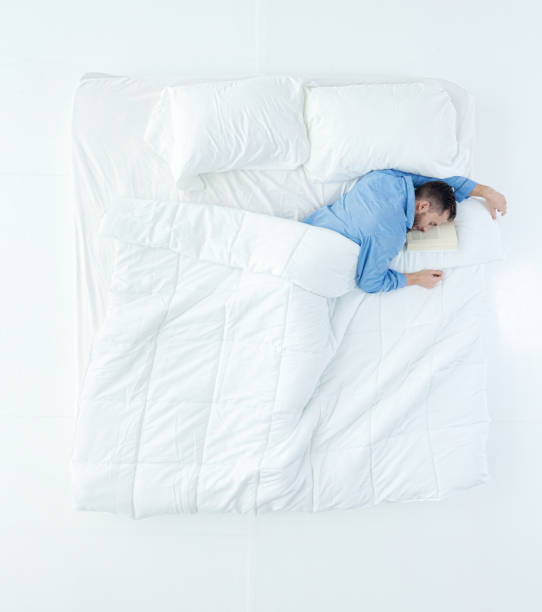 istock Above view of man in bed 916766994