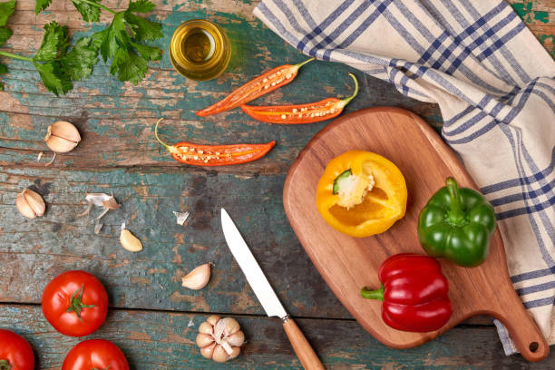istock Include fresh organic vegetables and wood cutting board on wooden floor with copy space still life 916769754