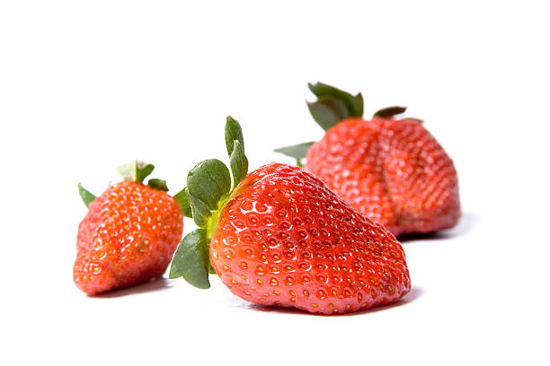 Fresh Strawberry Three fresh strawberry. On white cerial stock pictures, royalty-free photos & images