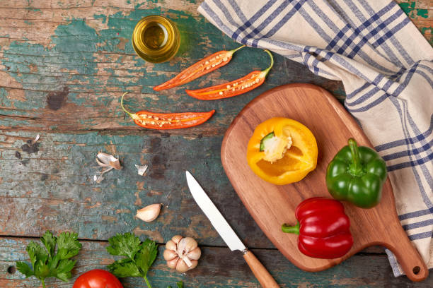 istock Include fresh organic vegetables and wood cutting board on wooden floor with copy space still life 916772662