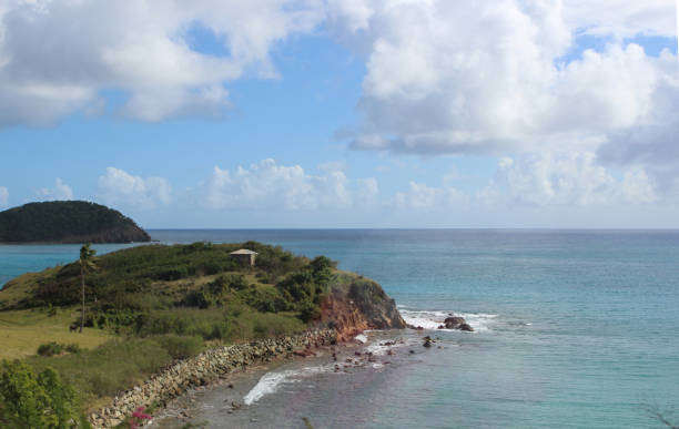 istock tropical coastline with sea and clouds 916776000