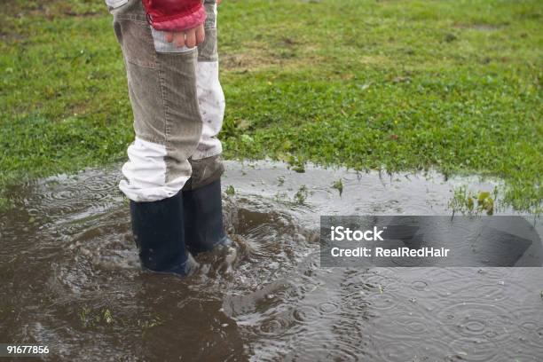 Enjoy The Rain Stock Photo - Download Image Now - Avalanche, Boot, Child