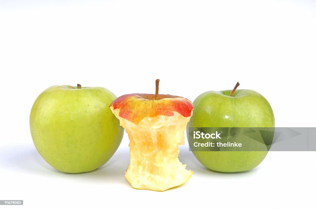 Drei Äpfeln, eine Gegessen - Lizenzfrei Apfel Stock-Foto