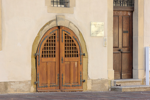 historical city schwaebisch gmuend catholic church details ornaments and roof in south germany sunny summer day