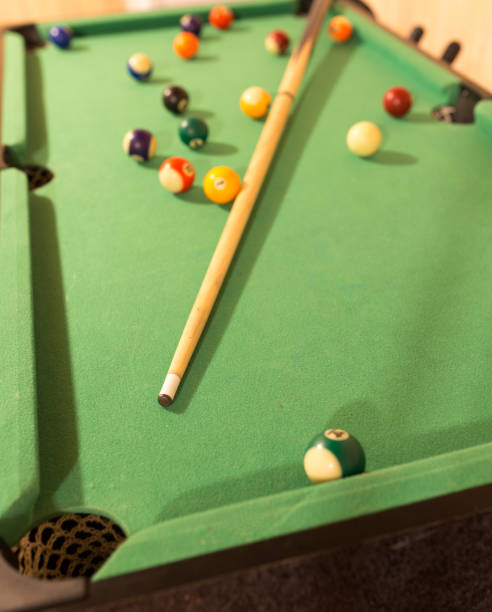 istock Board game with balls and cue billiards 916785618