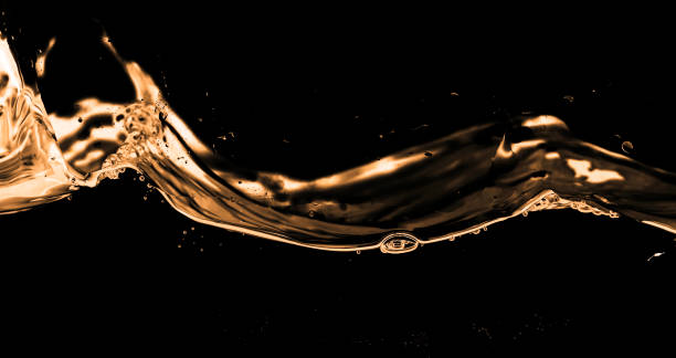 istock Water smooth with splashes on a black background 916786102