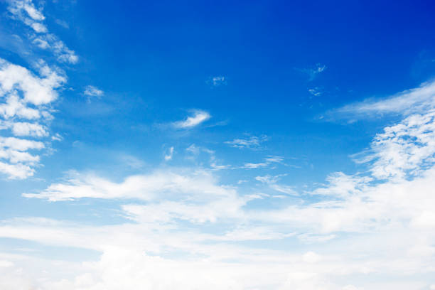 istock Soft white clouds against blue sky background and empty space for your design, beautiful of nature 916789394