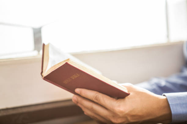 istock A man reading the Holy Bible. 916789934