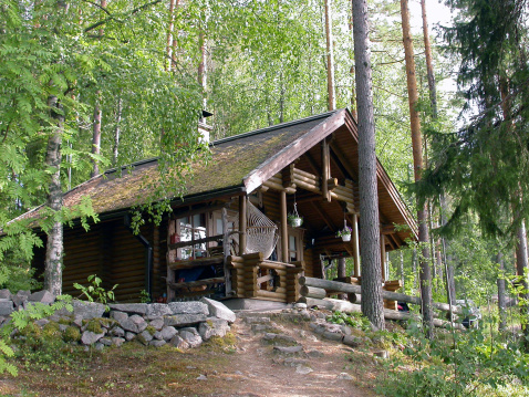 A log cabin in the Finnish forest.