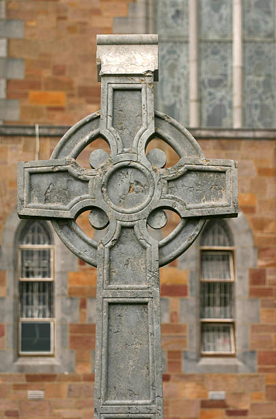 istock stone cross in church yard, ireland 91679918