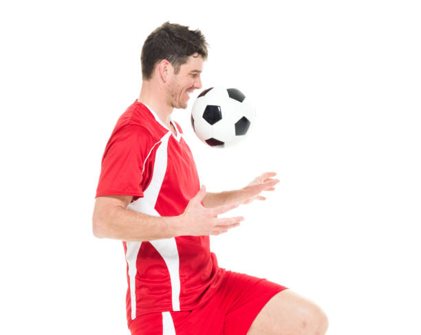 istock Soccer player kicking the soccer ball 916799604