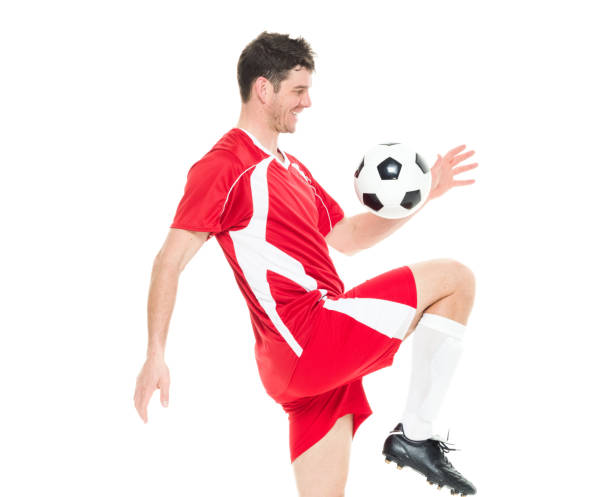 istock Soccer player kicking the soccer ball 916799622