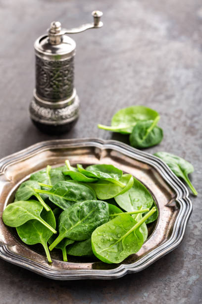 istock Fresh baby spinach leaves 916803200