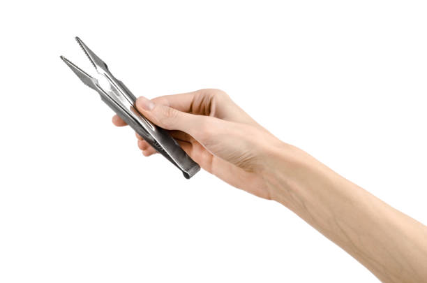 istock Hookah topic: Bartender holding a hookah coal tongs isolated on a white background 916806798