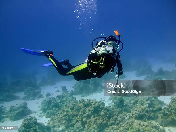 Underwater Photographer Stock Photo - Download Image Now - Adult, Blue, Bubble