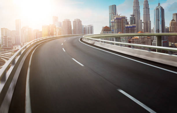 istock Motion curvy flyover asphalt highway road 916811946