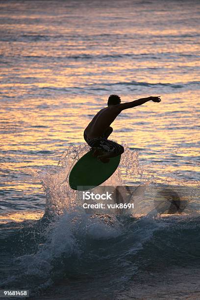 Surfer On The Waikiki Beach Stock Photo - Download Image Now - Big Island - Hawaii Islands, Adult, Aquatic Sport