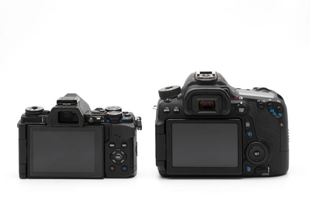 istock Back View of Mirrorless Camera and DSLR Camera Isolated on White Background 916817546