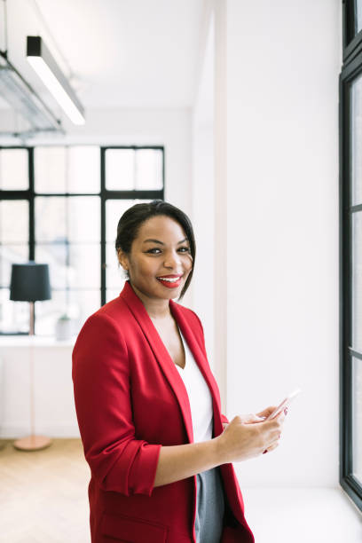 istock Businesswoman Using Smartphone 916818722