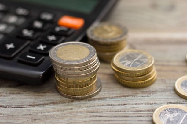 istock Coins stacked on each other in different positions 916821924