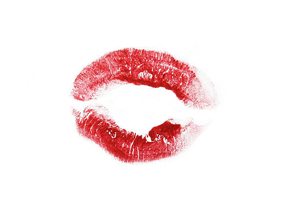 Kiss stamp on white paper stock photo