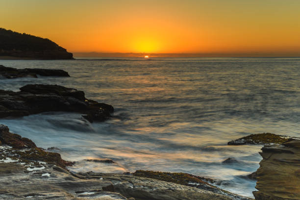 istock Rocky Sunrise Seascape 916825250