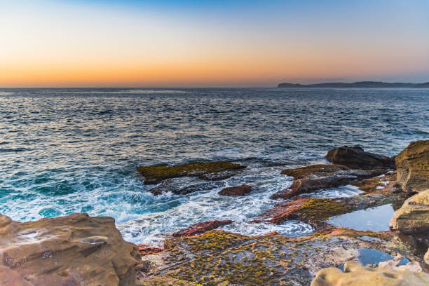 istock Rocky Sunrise Seascape 916825252