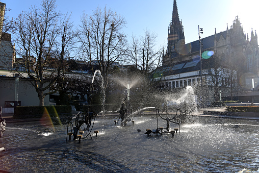 The famous Tinguely Fountain in the Center of Basel City next to the Theater. The fountain was created in 1977 on the place where the Theater was located before.