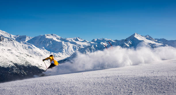 Man speed skiing on ski resort in Bormio, Italy stock photo