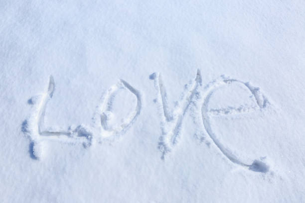 istock love written in the snow 916829220