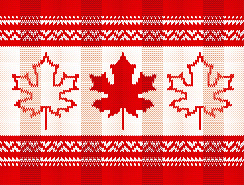 Seamless knitting pattern with maple leaves and ornamental stripes in red and white colors