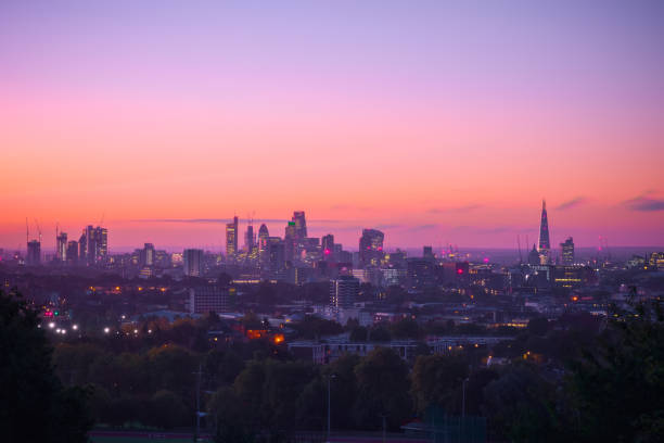 London city skyline at sunrise from Hampstead Heath